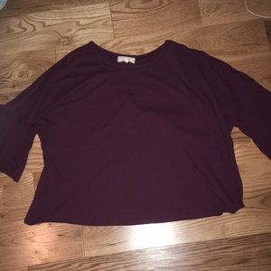 burgundy blouse with flowy sleeves